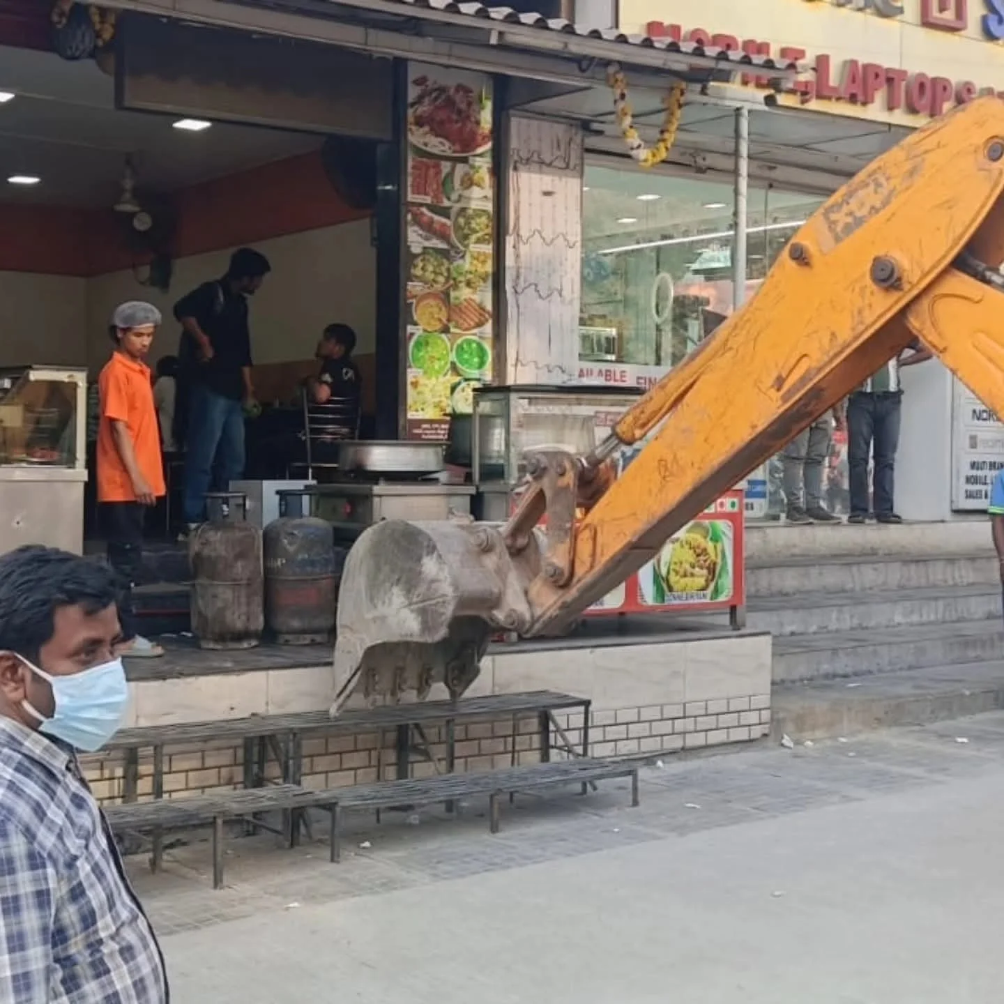Footpath encroachment clearance drive AECS Layout 60 Feet Road Bengaluru