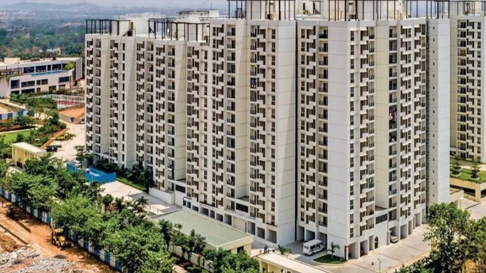 Vertical housing in India showing high-rise residential buildings in Bengaluru and other Karnataka cities with urban density and modern infrastructure.